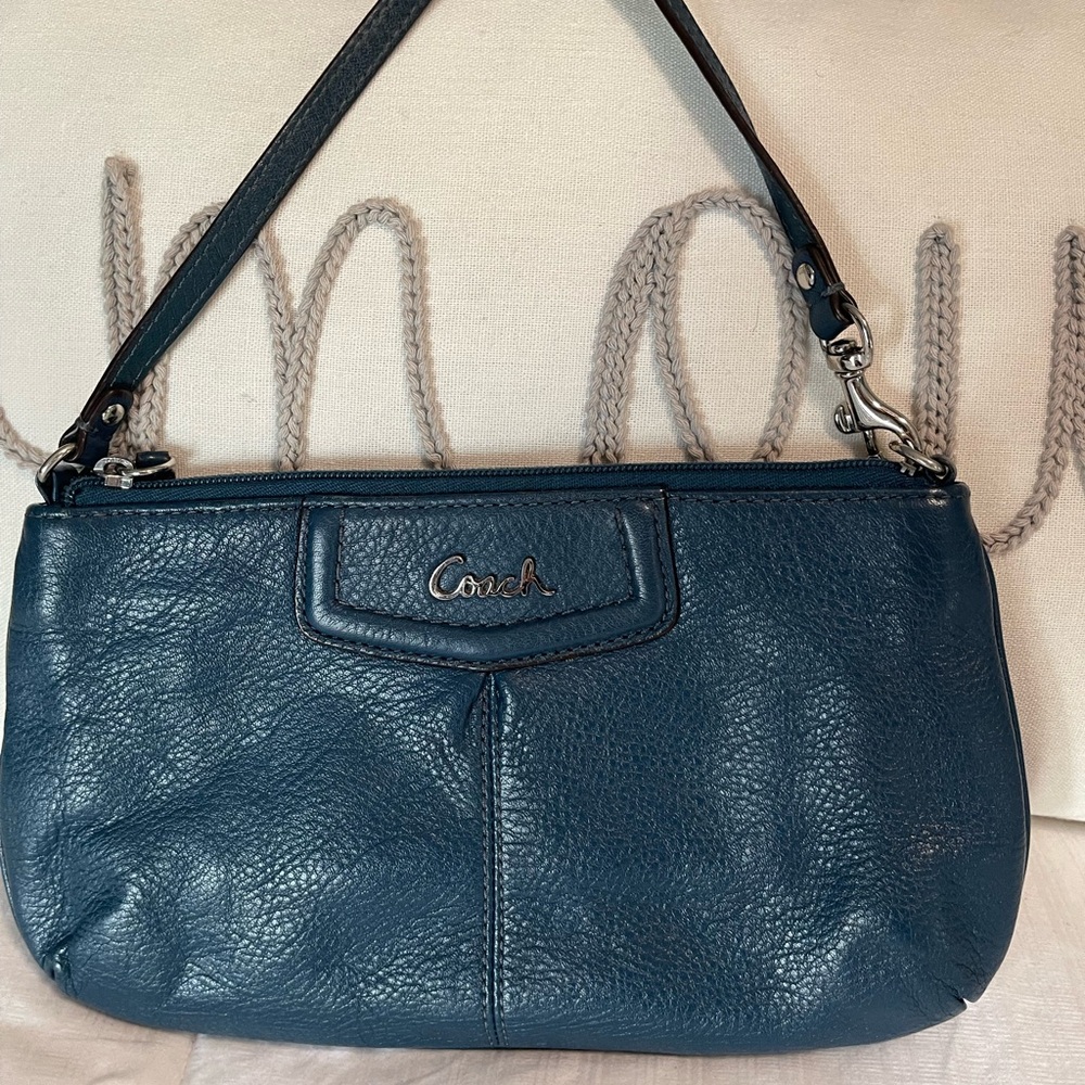 Coach leather wristlet . Turquoise blue